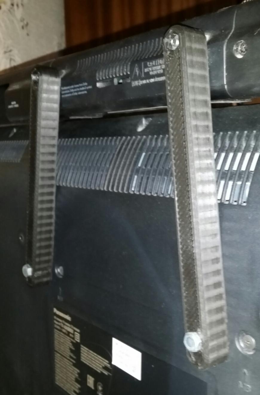 Крепление колонки к телевизору.